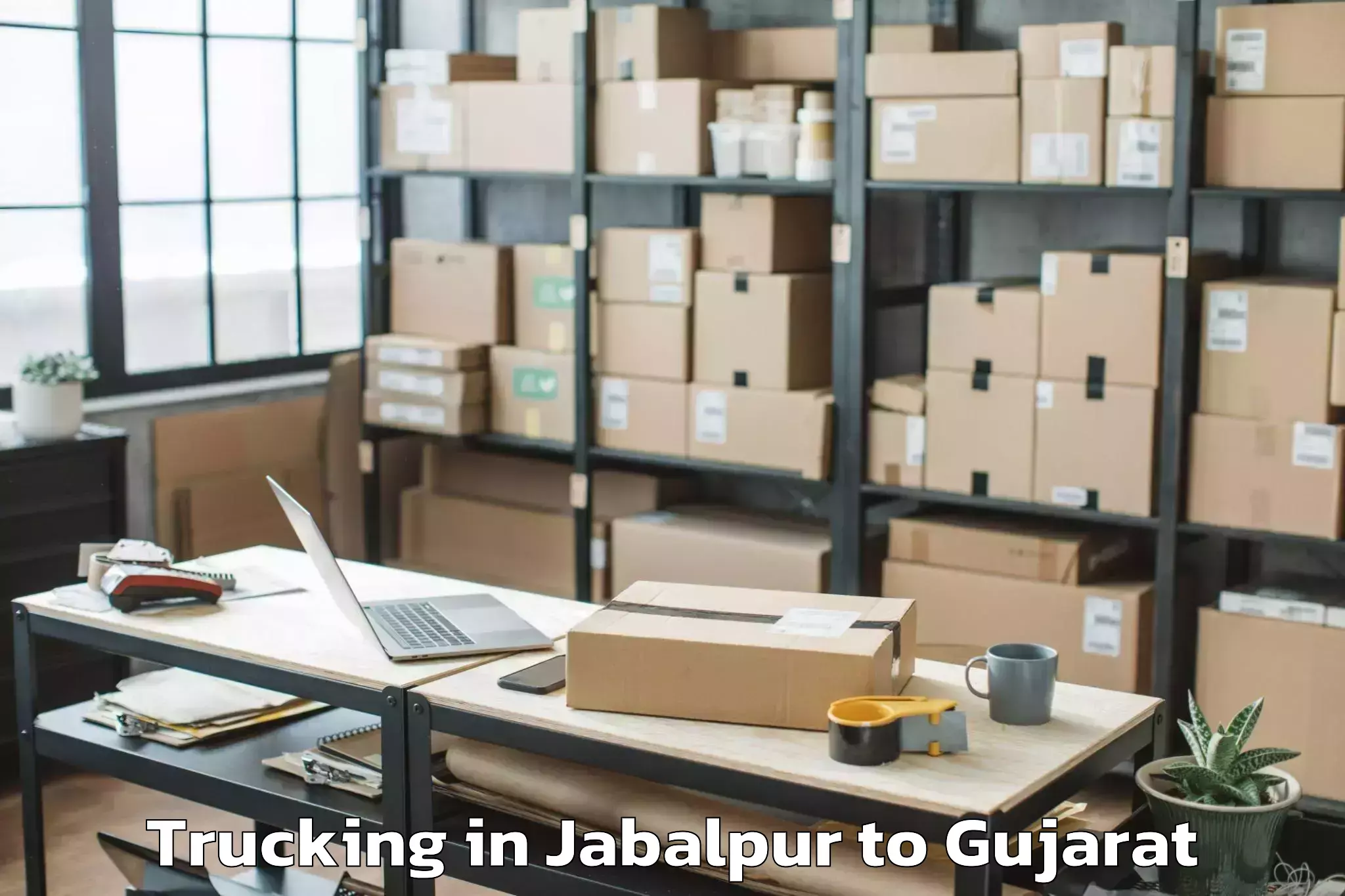 Book Jabalpur to Bedi Trucking Online